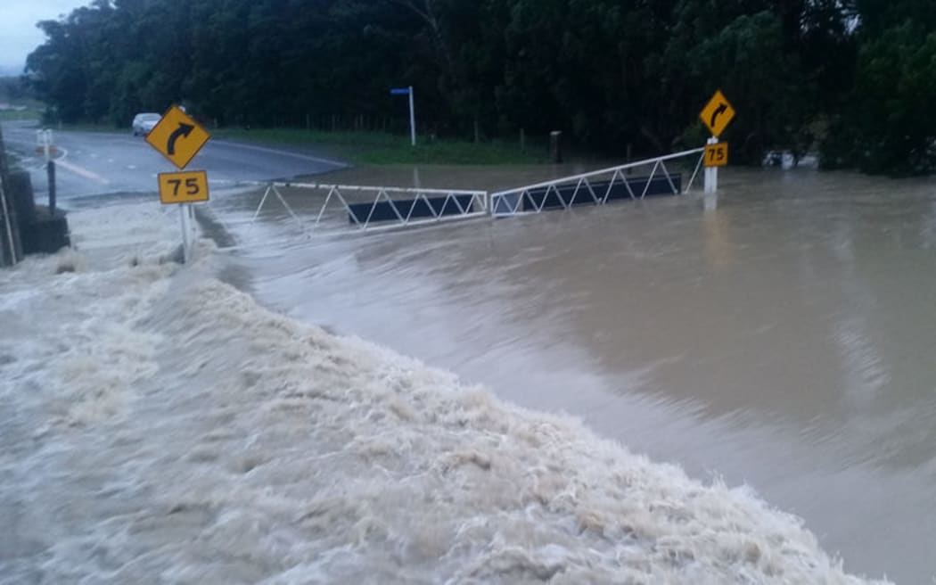 A flooded bridge on SH53 to Martinborough.