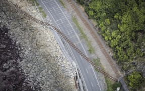 Coastal Road to Kaikoura - rail road cuts through state highway 1