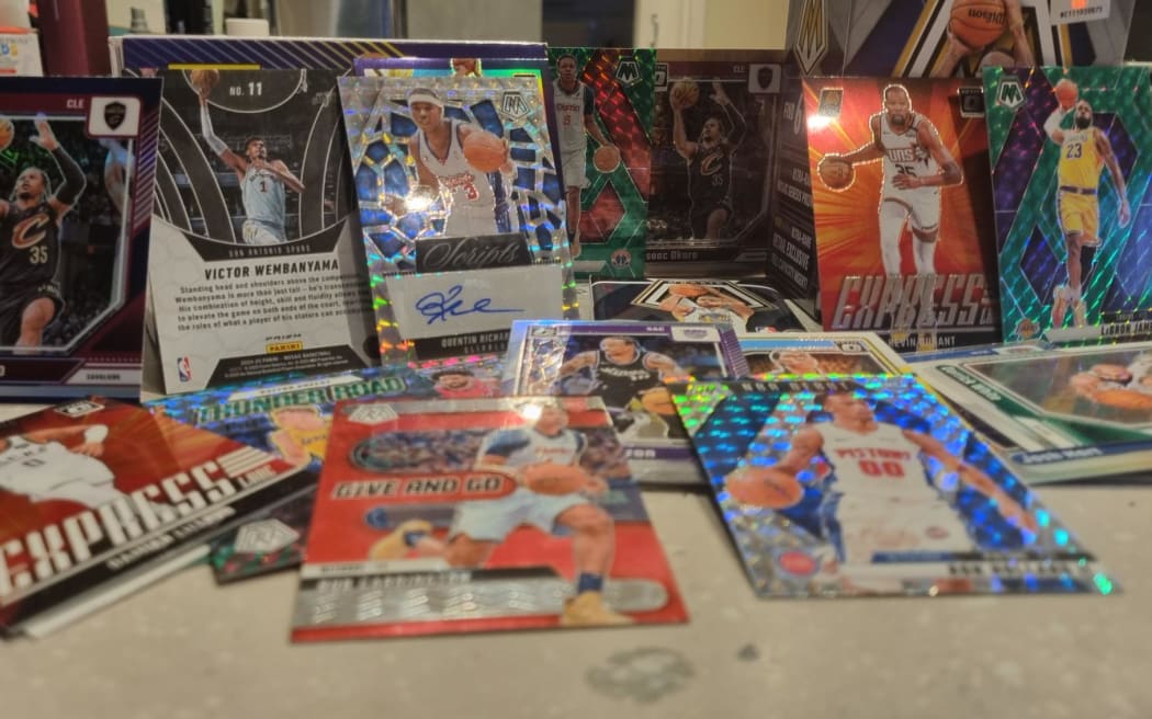 A selection of Panini NBA trading cards.