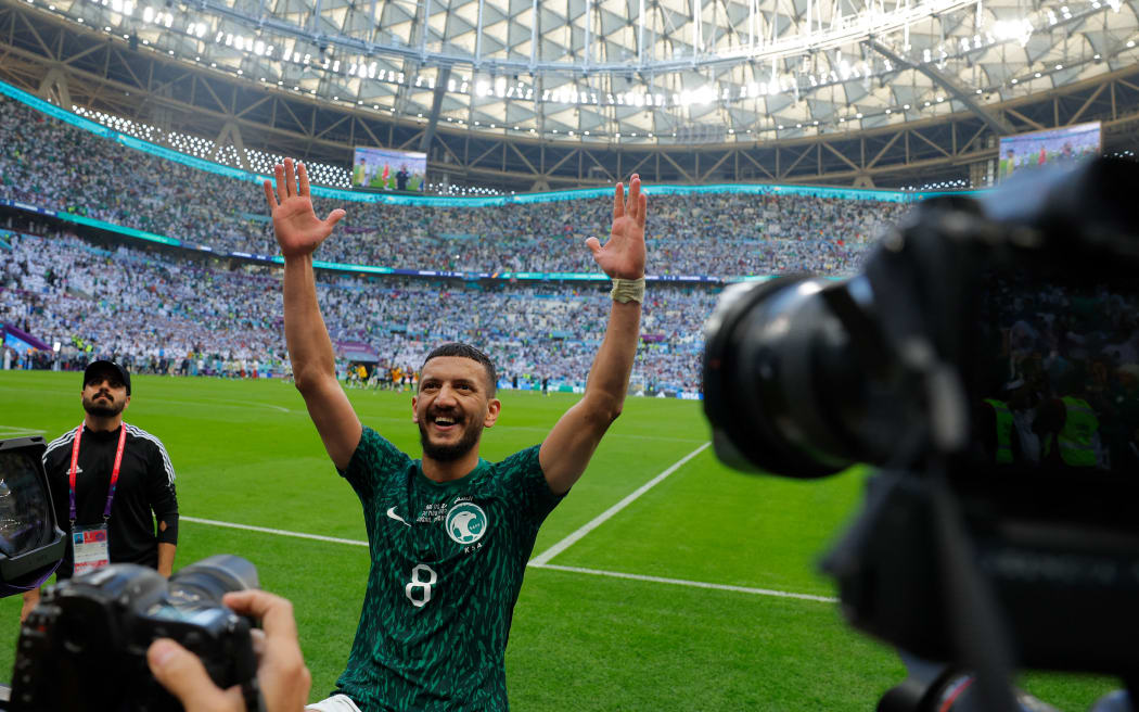 Saudi Arabia's midfielder #08 Abdulellah Al-Malki gestures to the fans after the Qatar 2022 World Cup Group C football match between Argentina and Saudi Arabia.