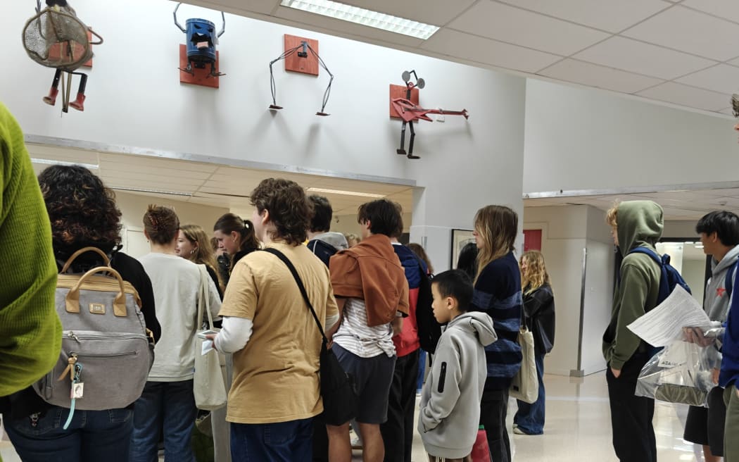 Raymond Hsu stands among the teenagers, ready to take his NCEA exams.