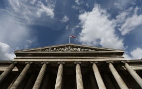 (FILES) The facade of the British Museum is pictured in central London on August 24, 2018. The British Museum on Wednesday said it had dismissed a member of staff after items from its collection were found to be "missing, stolen or damaged". The items included gold jewellery and gems of semi-precious stones and glass dating from 15th century BC to the 19th century, it said in a statement. (Photo by Daniel LEAL / AFP)