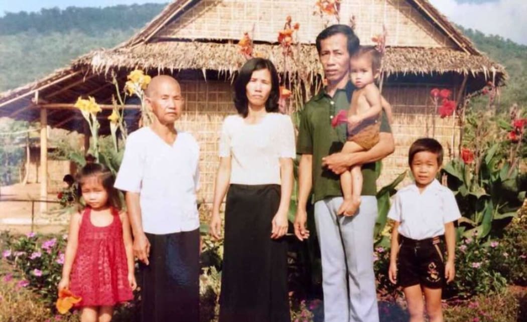 Bun Leng's family in a Thai refugee camp, in a photo taken before he was born.