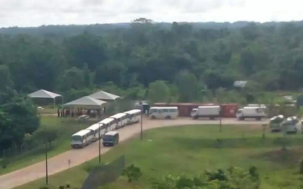 The convoy approaches the Manus Island detention centre.