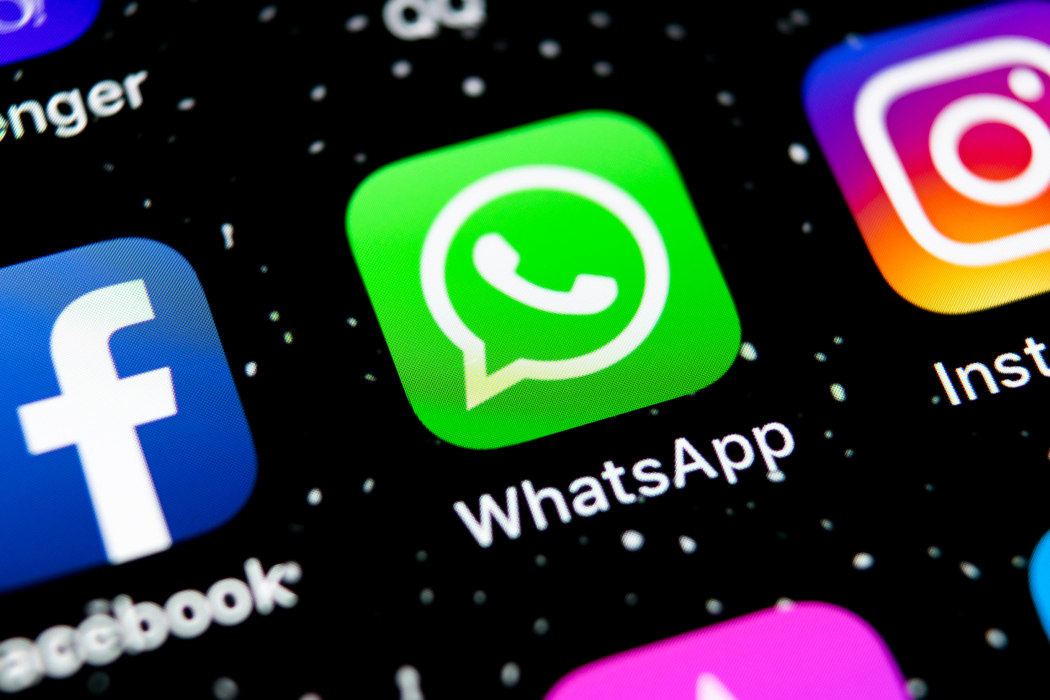 WhatsApp, Facebook and Instagram aps on an Apple iPhone X smartphone screen close-up.