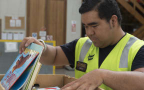 Books being packed by RNZAF for PNG