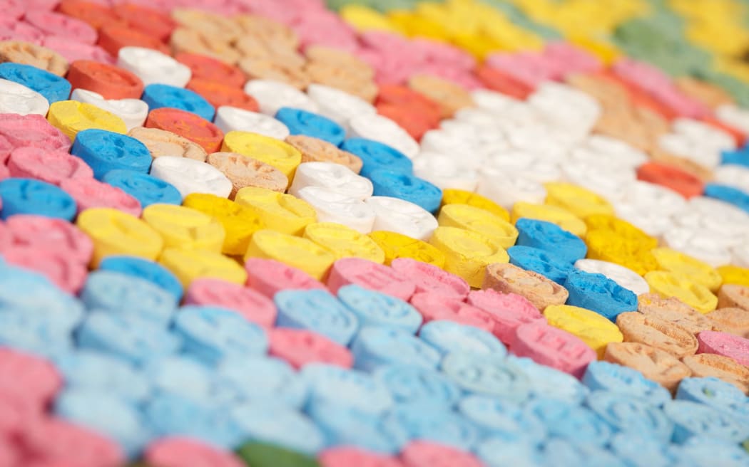 MDMA pills distributed by drug dealer seized by legal authority.