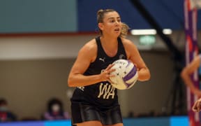 Gina Crampton playing for the Silver Ferns