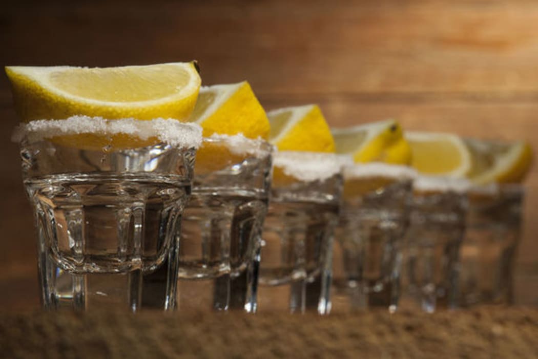 Dunedin City Council has dropped plans for a ban on serving alcohol shots after midnight.
