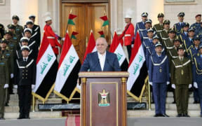 Prime Minister Haider al-Abadi announcing the end of a three-year war by Iraqi forces to drive the Islamic State out of the country.