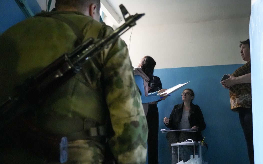 Residents cast their votes in controversial referendums in Donetsk Oblast, Ukraine on 23 September, 2022.