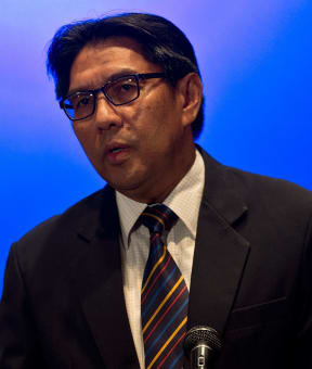 Azharuddin Abdul Rahman speaking to reporters on Monday.