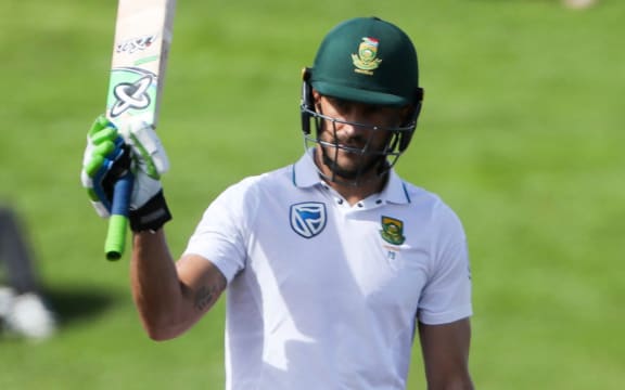 Faf du Plessis celebrates 50 runs.