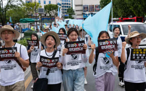 University students march in downtown Seoul to protest against the dumping of contaminated water from Fukushima, on 9 August, 2023 in South Korea.