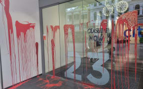 Red paint dripping down the doors of the United States consulate and Ministry of Foreign Affairs building in Auckland on 14 November, 2023.