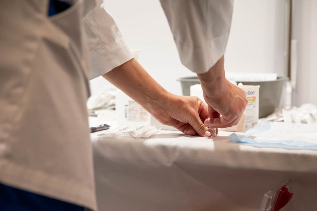 A Covid-19 being prepared in a hospital in Philadelphia, United States, 16 December.