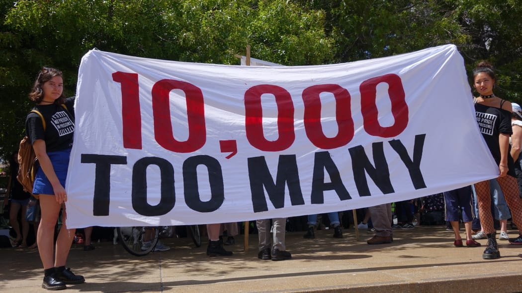 About 100 people attended the protest to mark New Zealand's prison population reaching 10,000.
