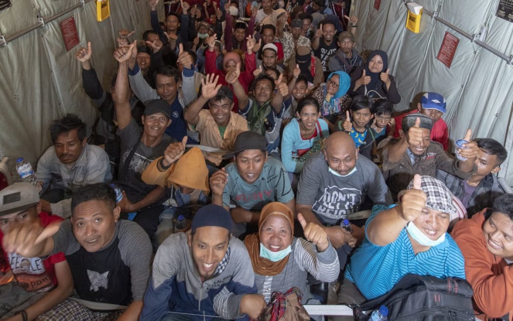 NZ Defence Force Hercules lands in Palu to evacuate displaced people.