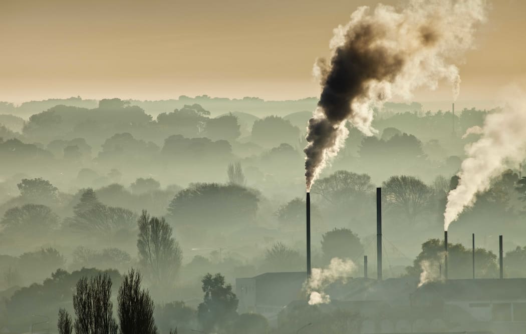 Factory smoke and winter smog above Christchurch. IPCC scientists say greenhouse gas emissions must be virtually eliminated.