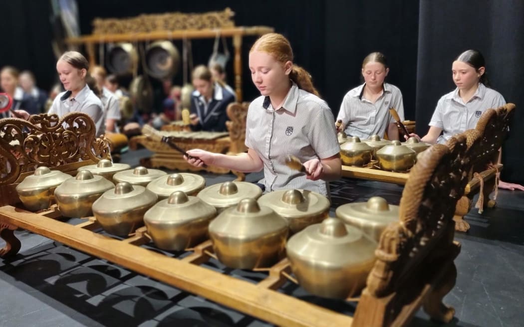 Taranaki Diocesan School for Girls student Emily Shelton tries her hand at gamelan.
