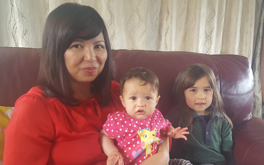 Sarany Sheridan is teaching her daughters Kate, eight months, and Frances, 5, to speak her community language Khmer.