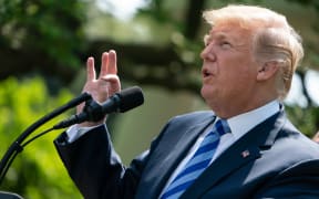 US President Donald Trump delivers remarks on reducing drug costs in the Rose Garden at the White House in Washington, DC, on May 11, 2018