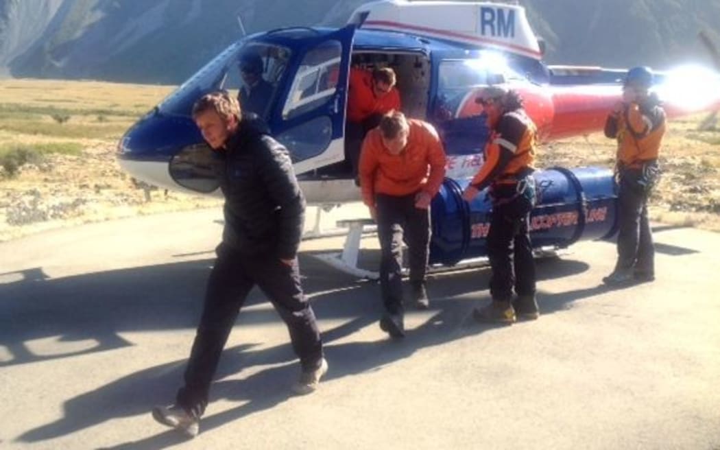 The three climbers after they were rescued