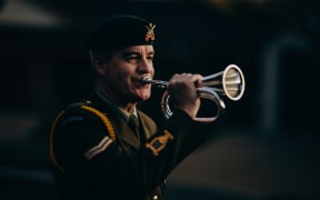 Tim Cook playing the bugle.