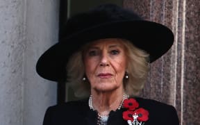 Britain's Queen Camilla attends the Remembrance Sunday ceremony at the Cenotaph on Whitehall in central London on November 9, 2025. Remembrance Sunday is an annual commemoration held on the closest Sunday to Armistice Day, November 11, the anniversary of the end of the First World War and services across Commonwealth countries remember servicemen and women who have fallen in the line of duty since WWI. (Photo by HENRY NICHOLLS / POOL / AFP)