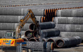 This file photo taken on September 7, 2020 shows gas pipes bound for the Russian pipe laying vessel Akademik Cherskiy, as the ship waited to continue pipe laying works for the Nord Stream 2 natural gas pipeline.