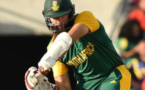 Hashim Amla hits a boundary during the 2015 Cricket World Cup quarter-final match between South Africa and Sri Lanka in Sydney on 18 March.