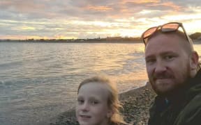 Cam McKie of Cam's Food Adventures with his daughter.