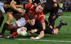 Beauden Barrett scores his first try.