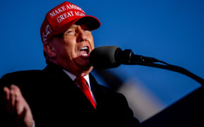 Republican presidential candidate, former President Donald Trump, speaks at a rally outside Schnecksville Fire Hall on 13 April, 2024 in Schnecksville, Pennsylvania. Hundreds of supporters waited hours in a line stretching for more than a mile to see Trump speak in a suburb of Allentown, Pennsylvania in the Lehigh Valley.