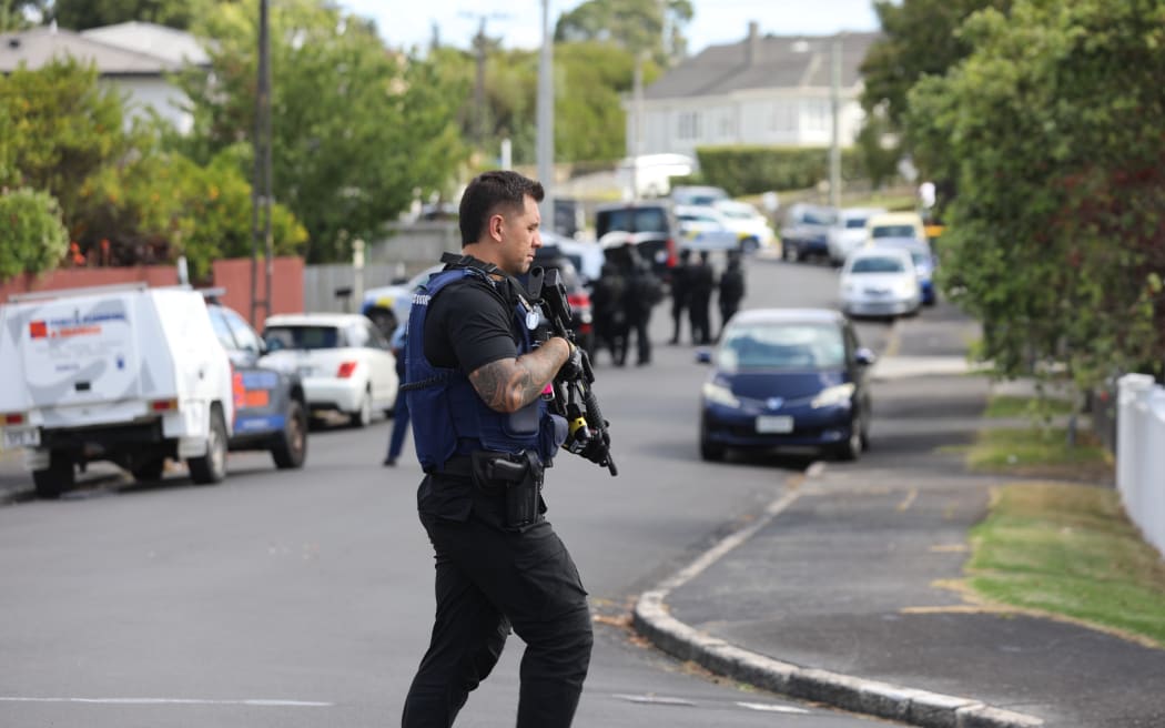 Armed police surrounded a property on Tutuki Street in the Auckland suburb of Waterview on 5 February, 2025.