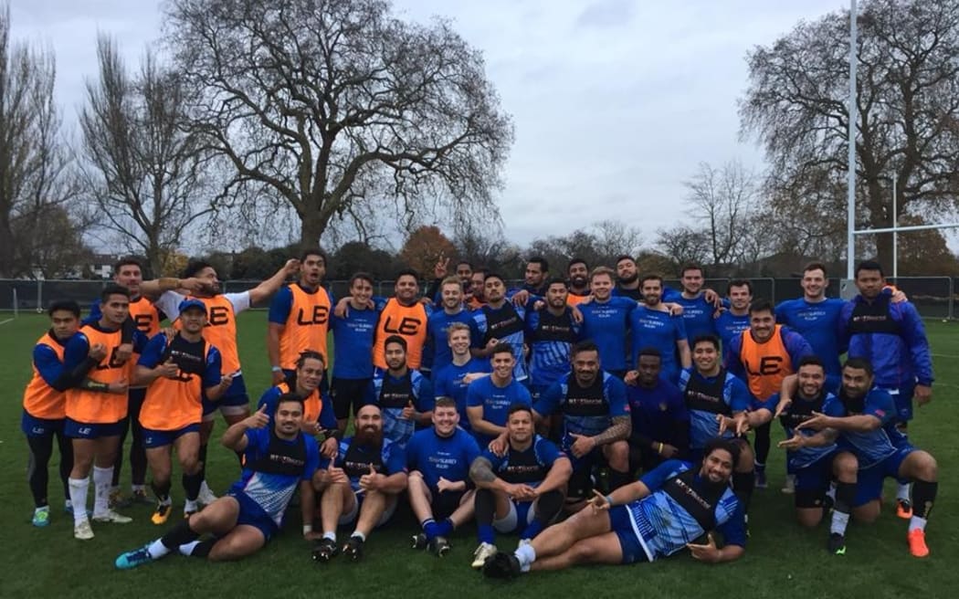 Manu Samoa players pose for a photo with players from Surrey Rugby after a training session in London this week.