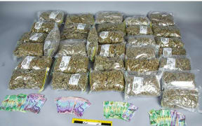 Cannabis and cash seized by Eastern District Organised Crime Group on 22 December 2023.