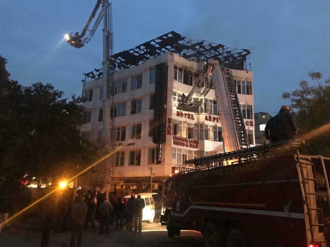 Photo from Sivanand Chand, a hotel guest who was rescued, during an early morning fire at the Arpit Palace Hotel in the Karol Bagh neighborhood of New Delhi, India, Tuesday, Feb.12, 2019.