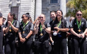 Fans celebrate the Black Ferns at an event at Parliament