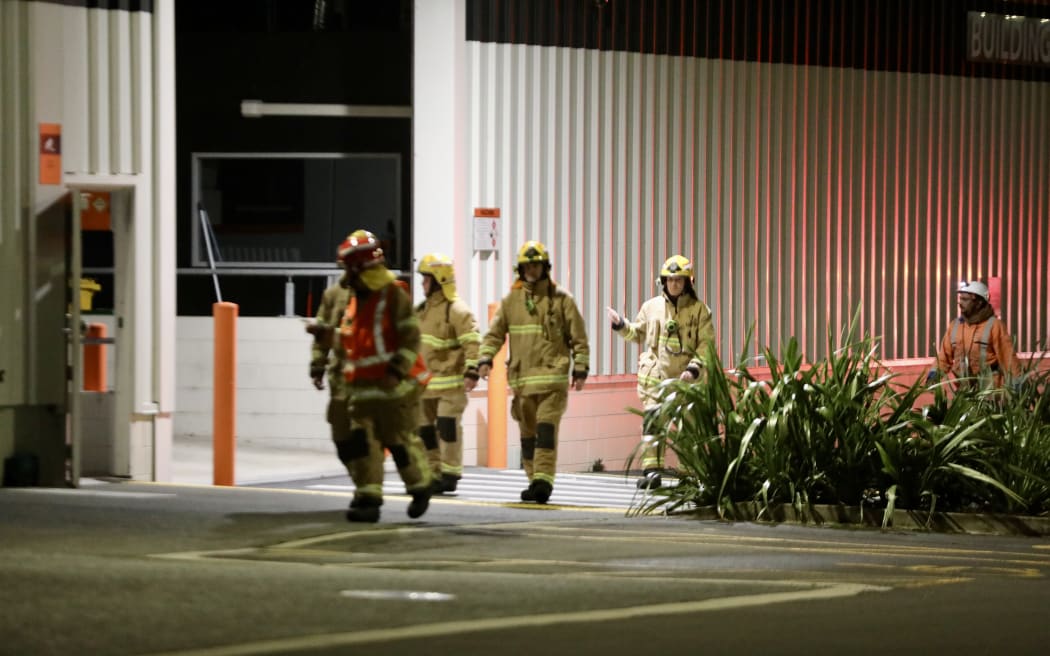 Smoke could be seen from one of the roller doors at Westgate Mitre 10.