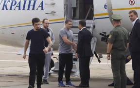 Ukrainian President Volodymyr Zelensky (3-R) welcomes released Ukrainians, who were  jailed in Russia, upon their arrival at the Borispil International Airport near Kiev, Ukraine, on 07 September, 2019