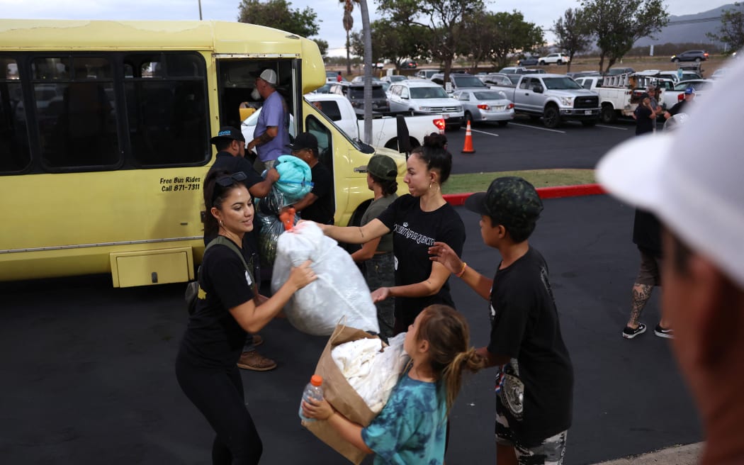 KAHULUI, HAWAII - AUGUST 10: Dozens of people were killed and thousands displaced after a wind-driven wildfire devastated the town of Lahaina on Tuesday. King's Cathedral Maui is providing food and shelter for displaced families.   Justin Sullivan/Getty Images/AFP (Photo by JUSTIN SULLIVAN / GETTY IMAGES NORTH AMERICA / Getty Images via AFP)