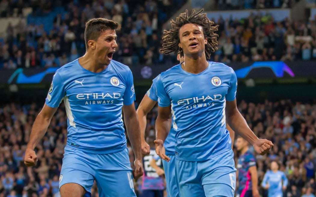 Manchester City players Rodri and Nathan Ake.