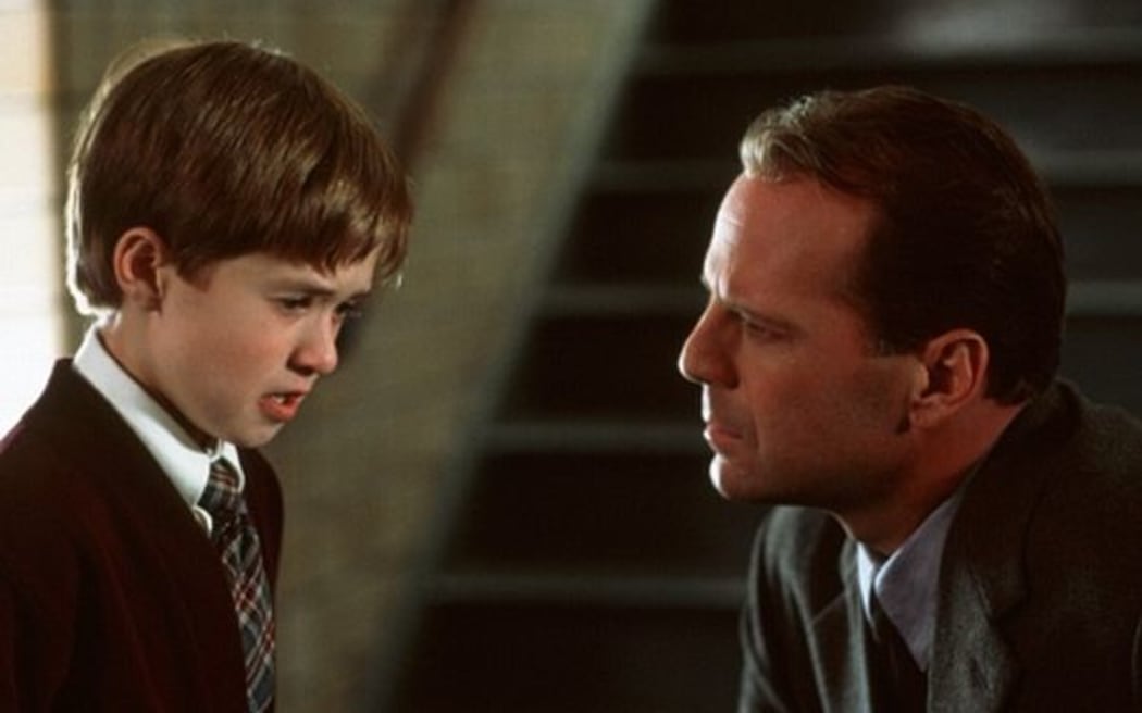Haley Joel Osment and Bruce Willis in The Sixth Sense (1999)