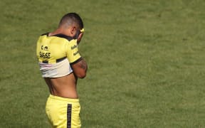 Phoenix's Yan Sasse walks from the field after a red card during the A-League game against Adelaide, 2022.
