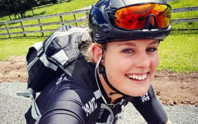 Elite cyclist Olivia Podmore pictured on her bike.