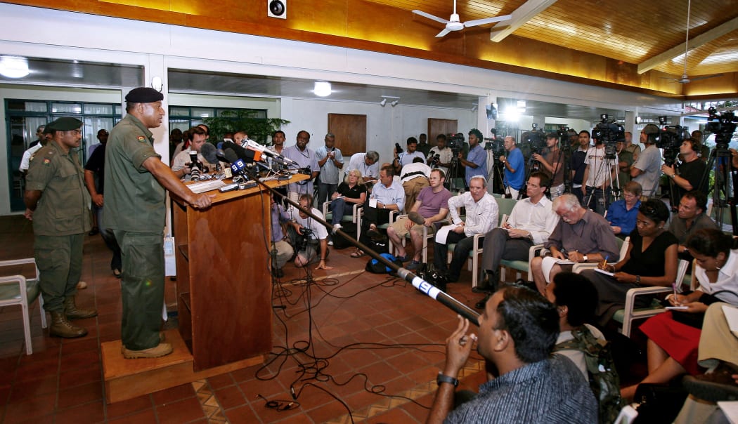 Coup leader Bainimarama reads out statement to media at QE Barracks