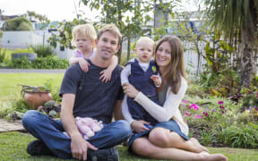 Rochelle and Joel Payne with their kids.