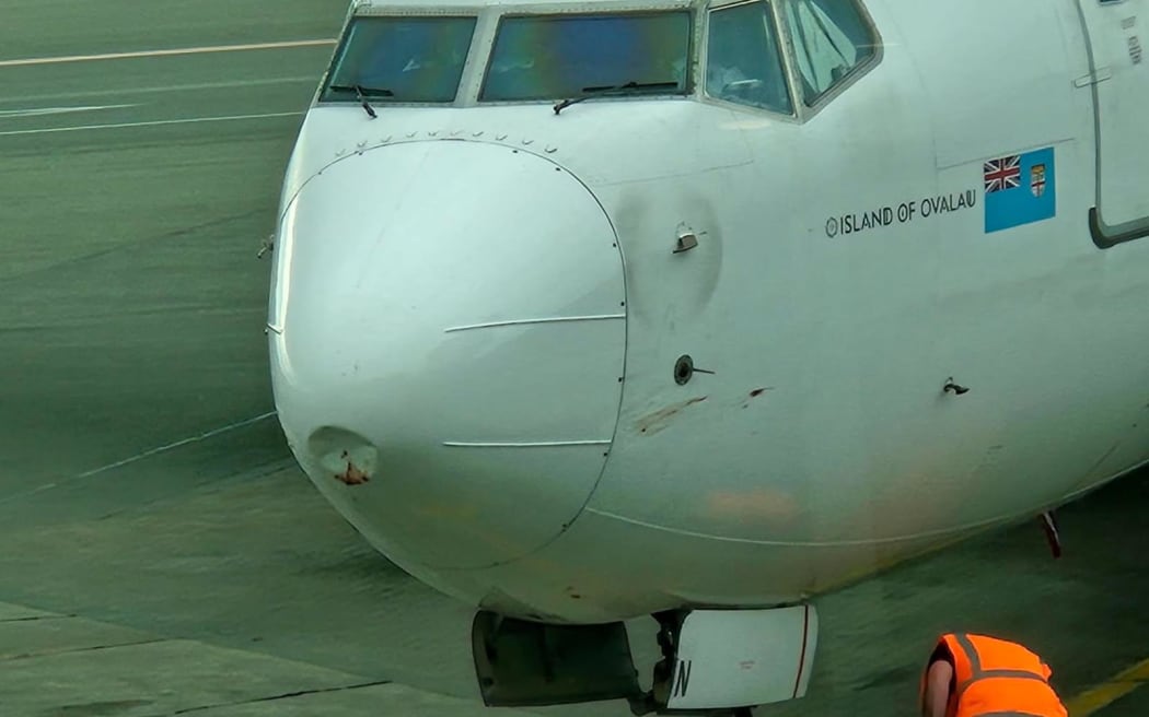 A large dent could be seen in the nose of the Fiji Air flight after it finally managed to land in Christchurch on Thursday afternoon.
