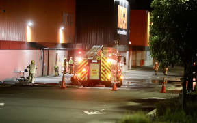 Smoke could be seen from one of the roller doors at Westgate Mitre 10.
